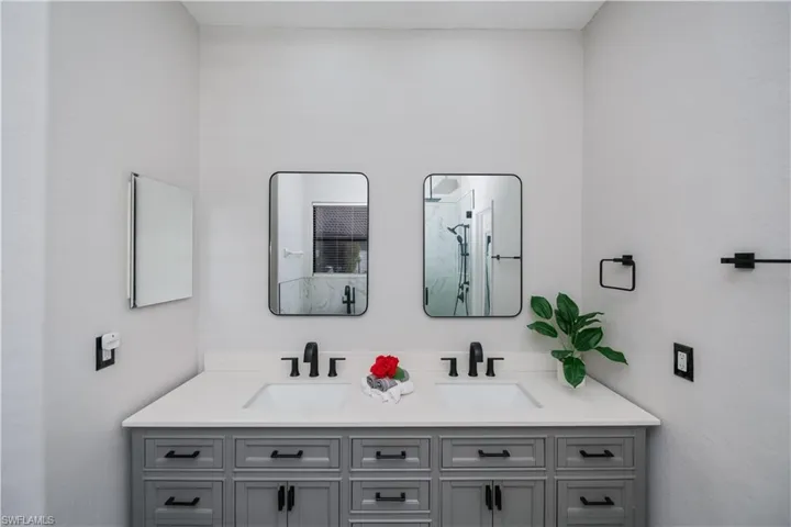 primary bathroom vanity with dual sinks