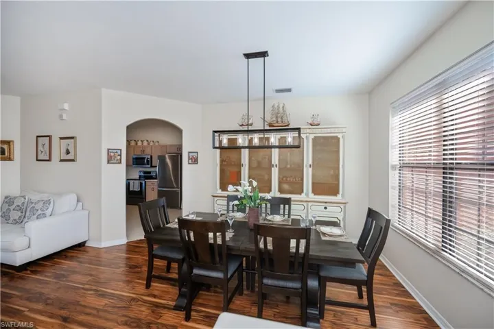 dining room looking into entrance to kitchen