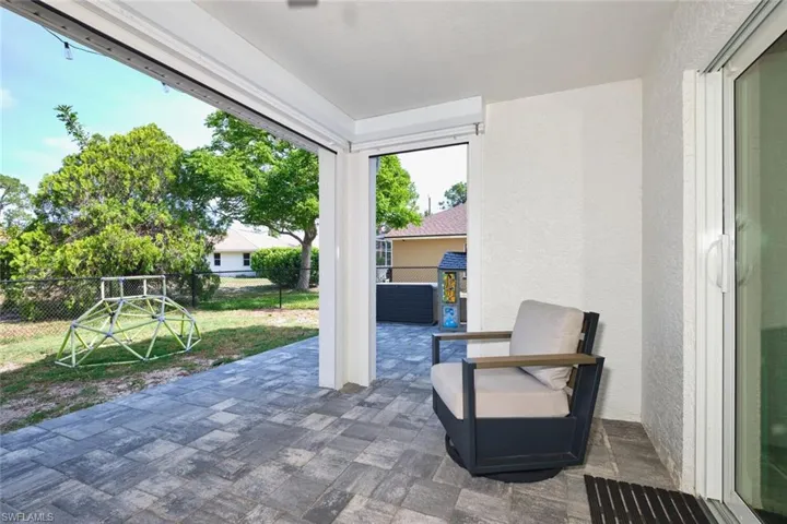 Fenced backyard with a patio area