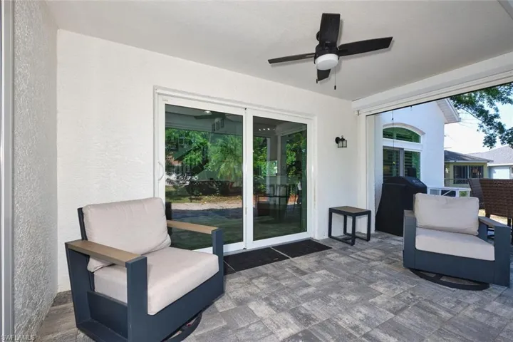 View of patio with ceiling fan