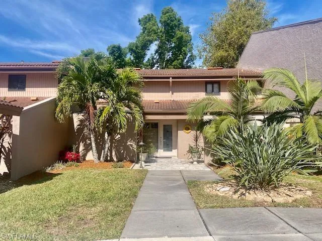 View of front of house with a front lawn