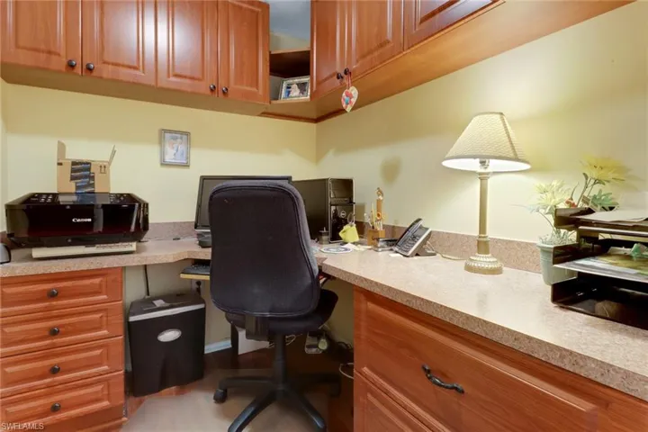 Office area with built in desk