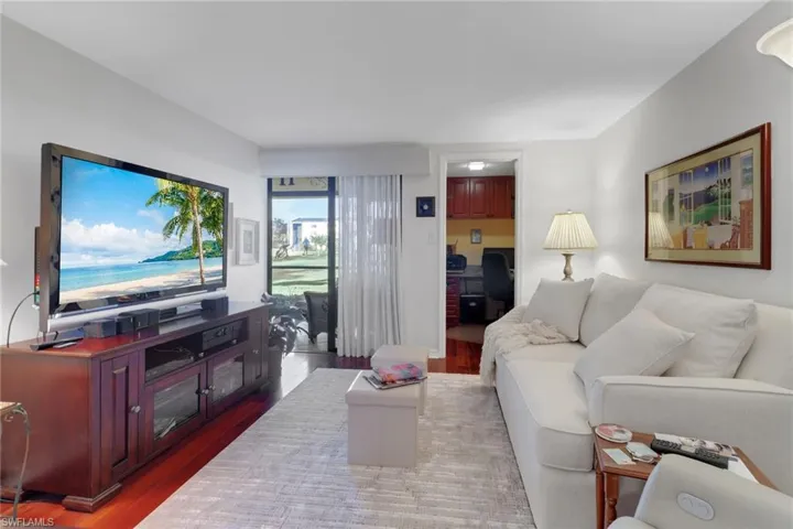 Living room with light wood-type flooring