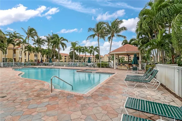 Community pool featuring a gazebo and a patio
