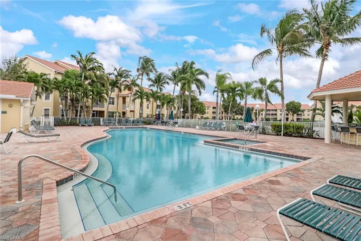 Community pool featuring a patio area