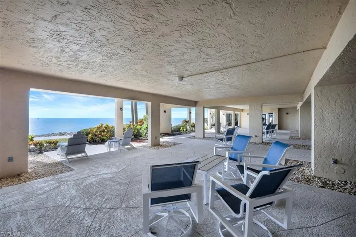 View of patio / terrace with a water view