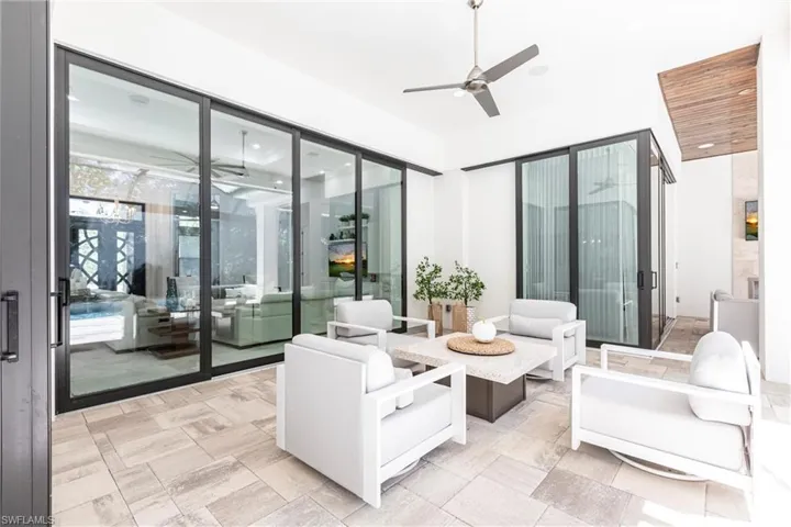 Living area featuring recessed lighting and ceiling fan