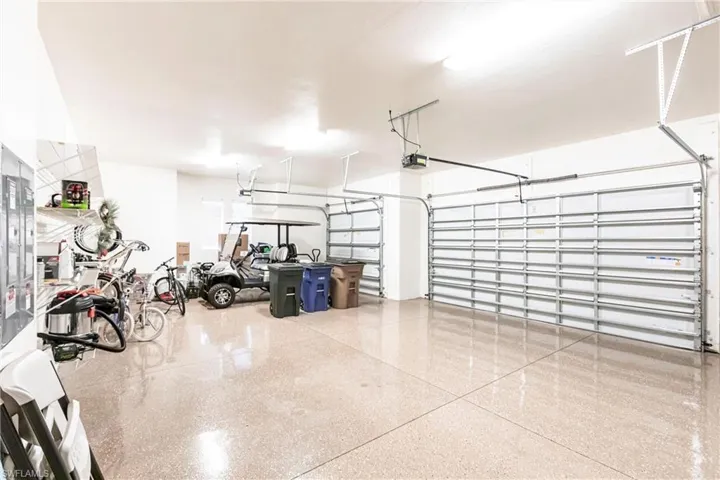 Garage featuring a garage door opener