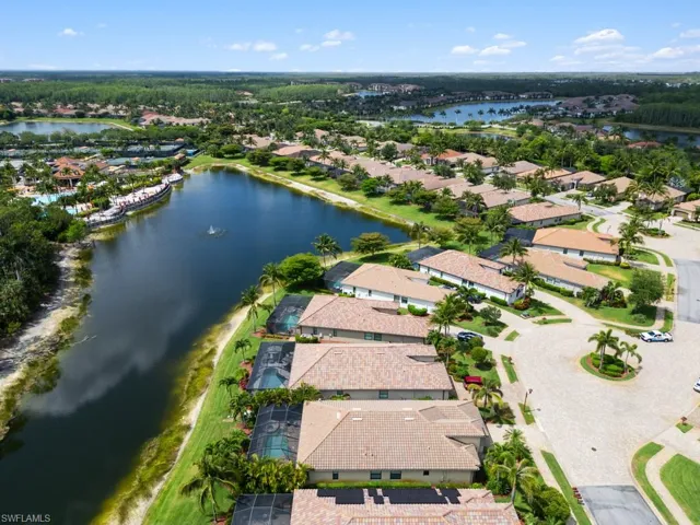 Aerial view with a residential view and a water view