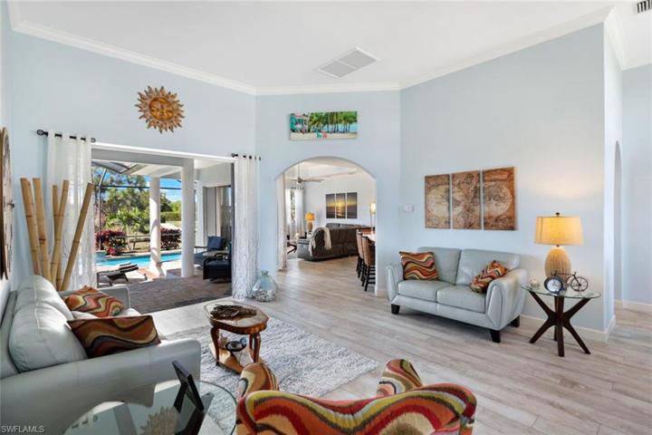 LIVING ROOM TO LANAI AND GREAT ROOM/KITCHEN