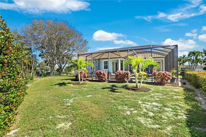 BACKYARD WITH ROOM FOR A PATIO FIREPIT AND FENCE