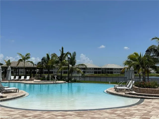Community pool with a patio area