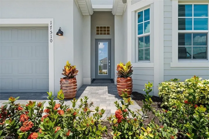 Entrance to property featuring a garage