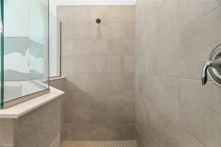 Bathroom with a tile shower