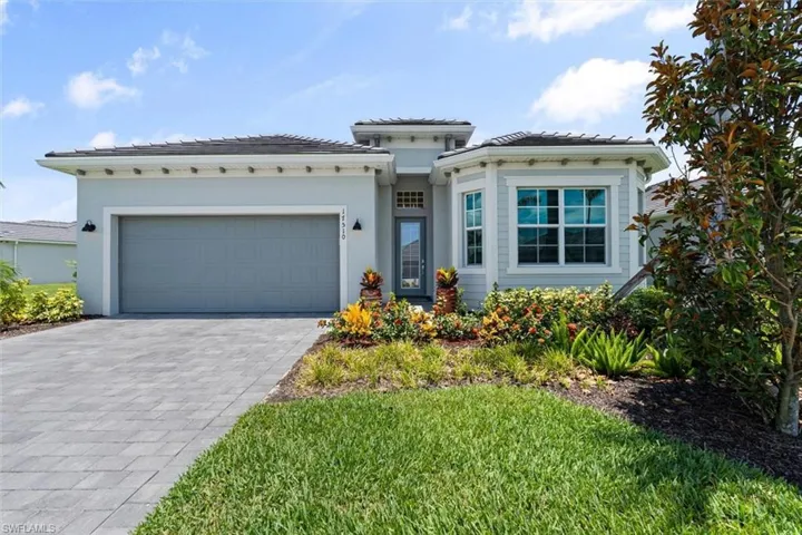 Mediterranean / spanish-style house featuring a garage