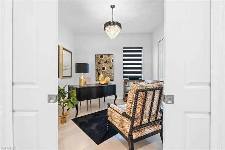 Office space with an inviting chandelier