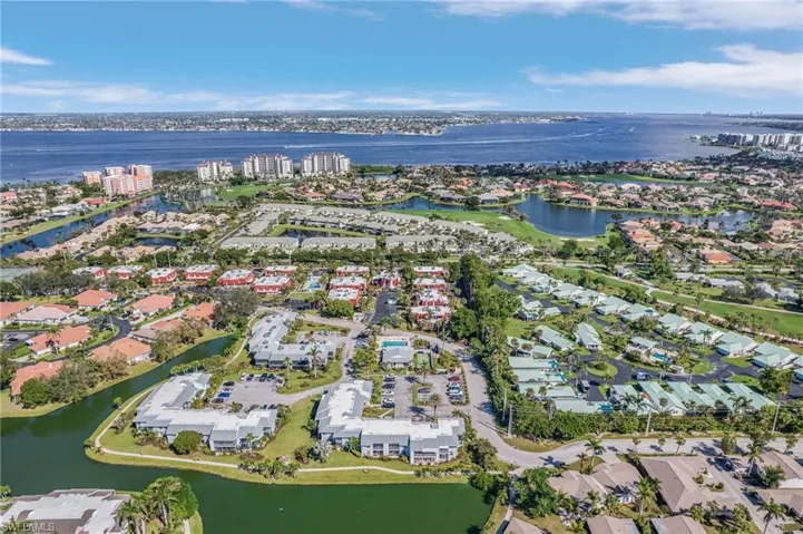 Aerial overview of property's location featuring nearby suburban area