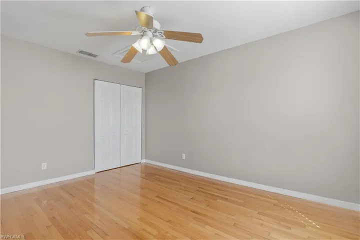 2nd floor 3rd bedroom featuring light wood-type flooring, a closet, and ceiling fan