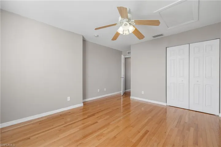 2nd floor 3rd bedroom with ceiling fan, light wood-type flooring, and a closet