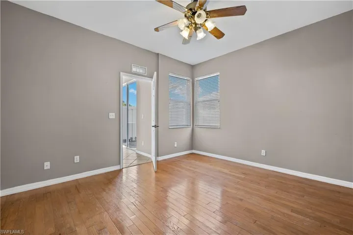 First Floor bedroom featuring ceiling fan and light hardwood / wood-style flooring