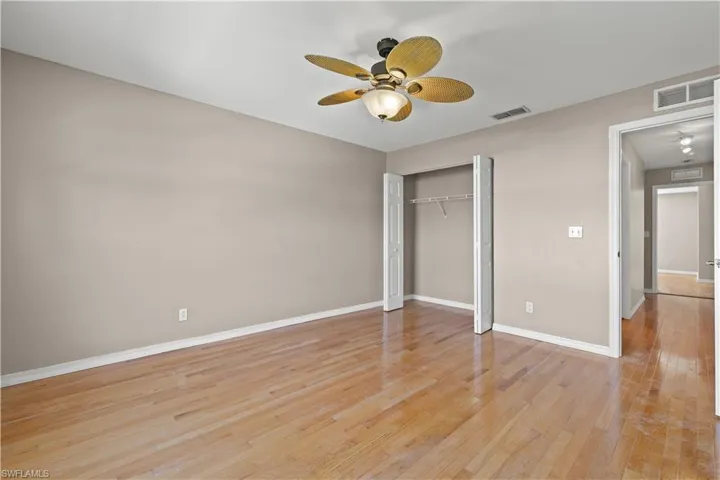 2nd floor bedroom featuring a closet, ceiling fan, and light hardwood / wood-style flooring