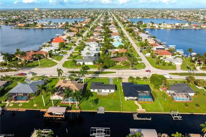Bird's eye view with a residential view and a water view