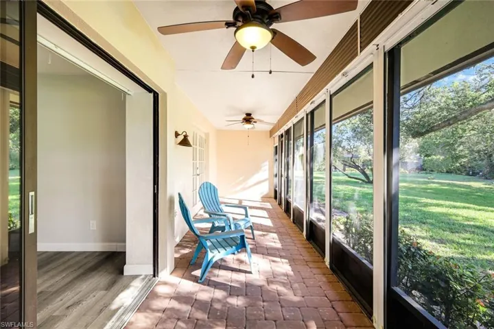 Screened lanai overlooking the beautiful Live Oak and lake!  Access the lanai by the master bedroom or living area!