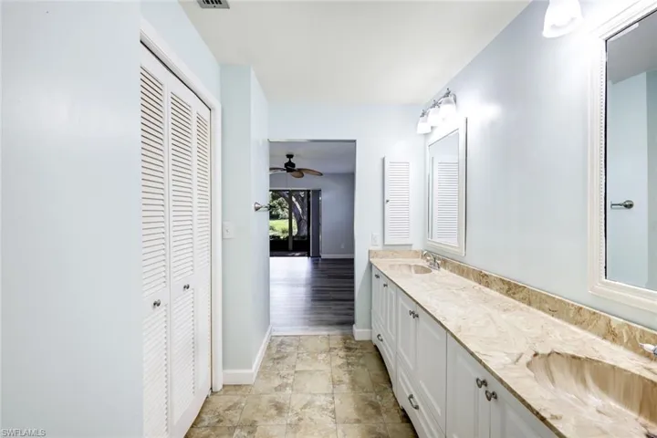Massive master bath vanity area (plenty of room to incorporate a make-up vanity/seat area) offering extra storage, 2 sinks with upgraded mirrors and lighting!