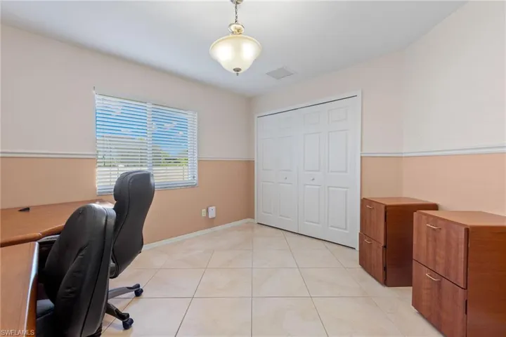 Bedroom 4 - laid out as an Office featuring light tile flooring