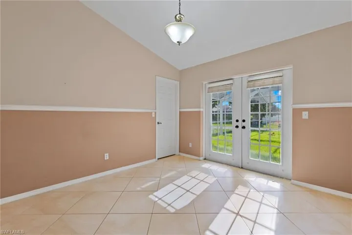 Bedroom 3 with walk-in closet and French door access to lanai.