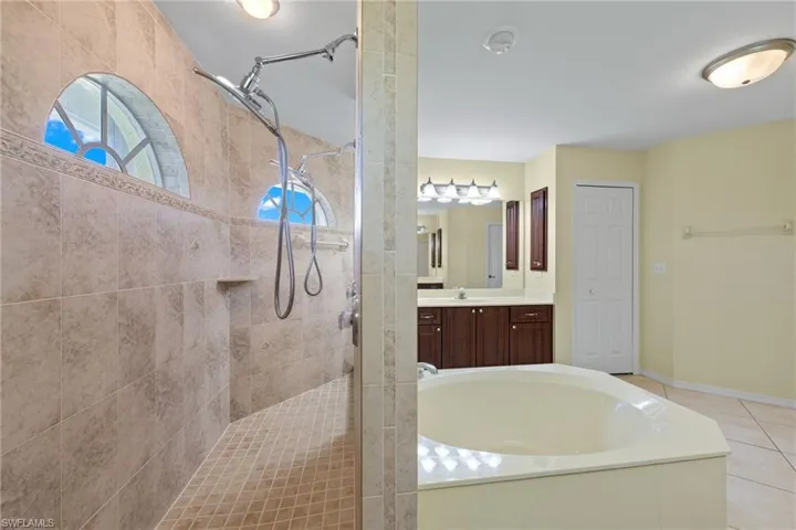 Walk behind shower with 2 shower heads/ controls