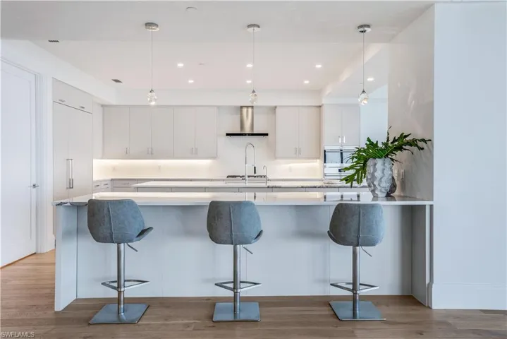 So much space to entertain. A kitchen island AND a breakfast bar - everyone will comfortably gather together for holidays and special occasions.