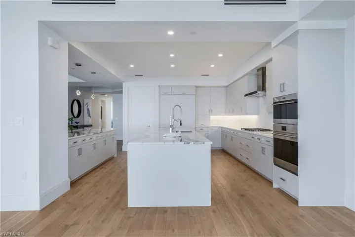 Volume ceilings add to the airiness of this home.