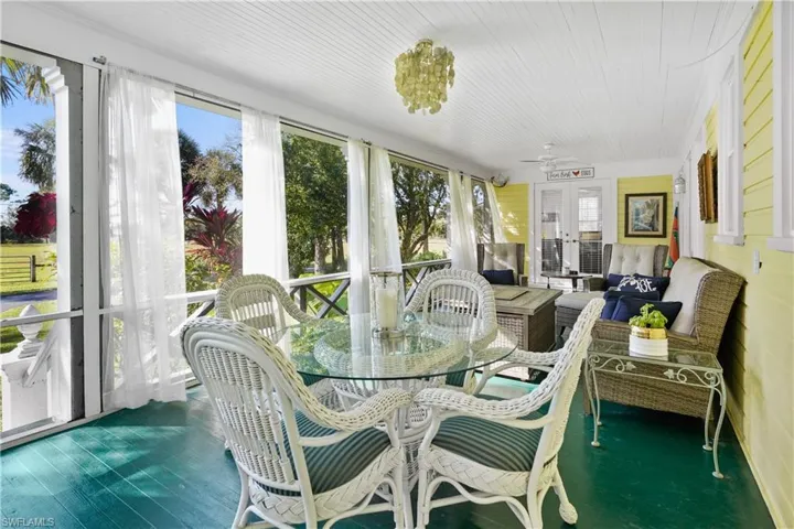 View from the French doors from owners suite to the fabulous screen porch.