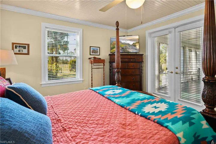 Owners suite has French doors that open to the screen porch.