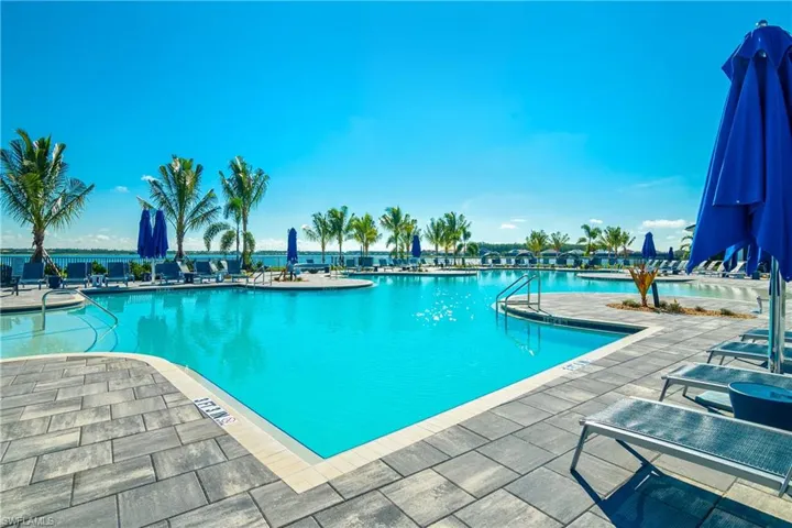 Community pool featuring a patio area