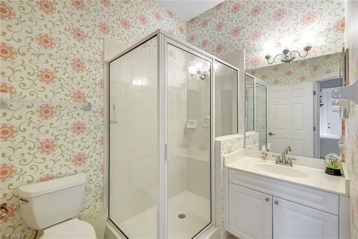 Guest bathroom with walk in shower.