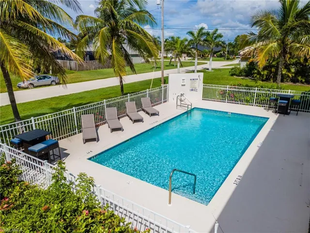 Community pool featuring a patio area