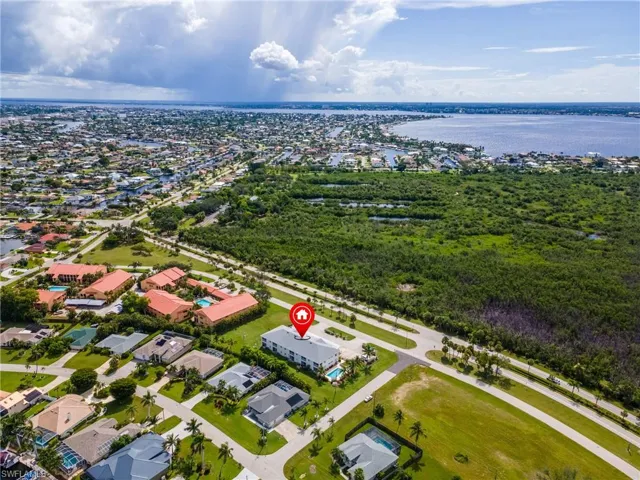 Aerial view of residential area with a nearby body of water