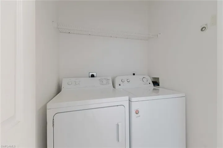 Laundry area featuring washing machine and dryer