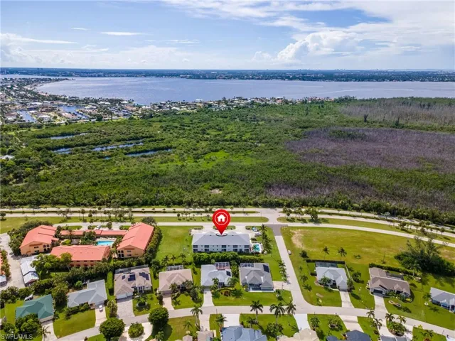 Aerial view of residential area with a nearby body of water
