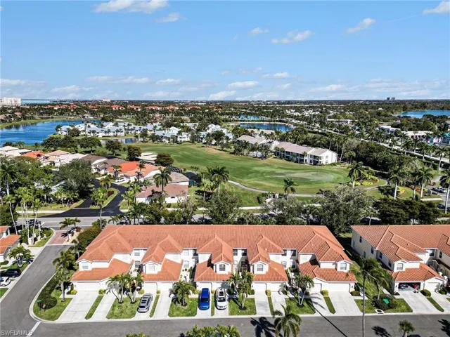 Aerial view of a local golf course and a nearby body of water