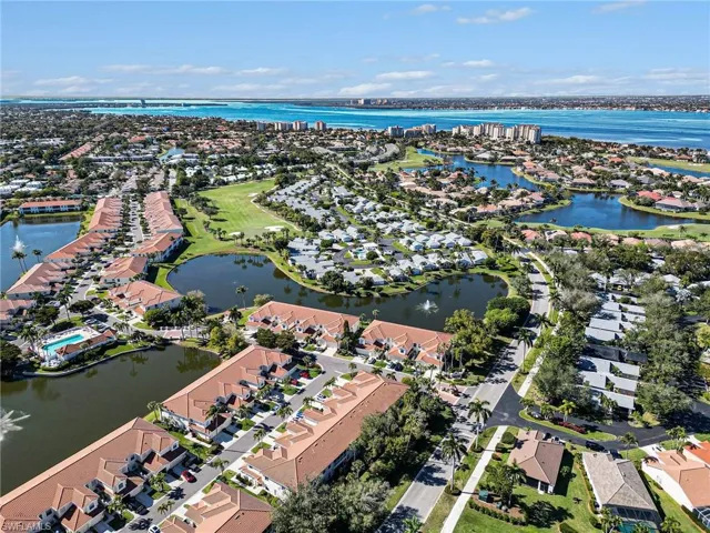 Aerial view of residential area with a nearby body of water