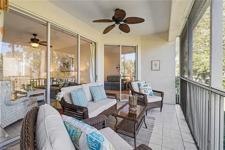 Sunroom with ceiling fan and an outdoor hangout area