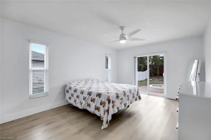 Access the patio from your spacious primary suite.