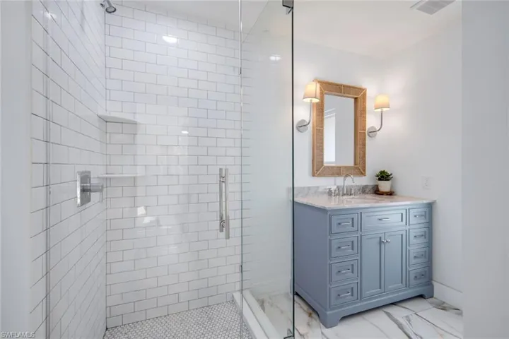 Ensuite primary bathroom has been tastefully updated.