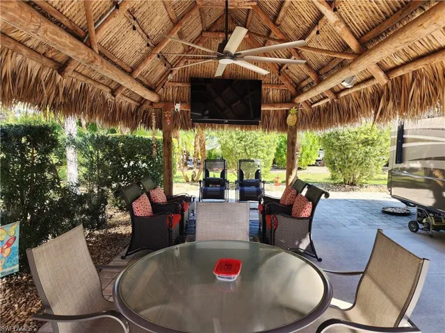 View of patio / terrace featuring a gazebo and ceiling fan
