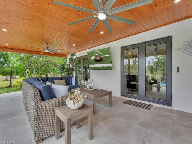 View of patio / terrace featuring outdoor lounge area, french doors, and ceiling fan