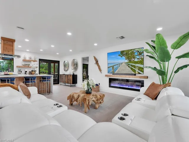 Living room featuring light hardwood / wood-style floors and french doors