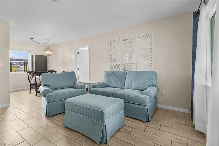 Living room with a notable chandelier
